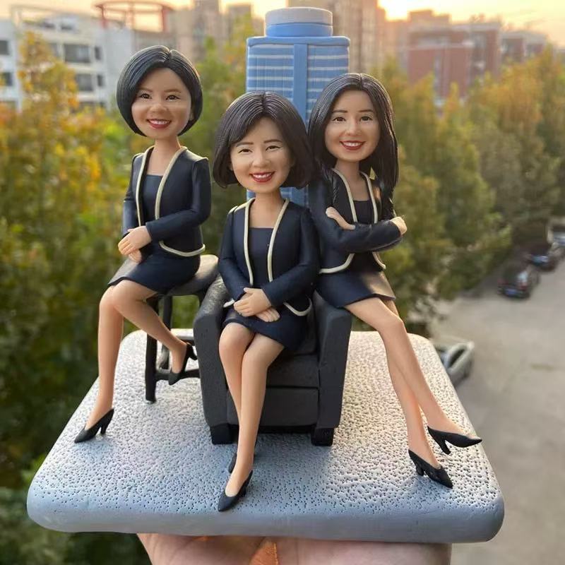 Customizable three Bobbleheads